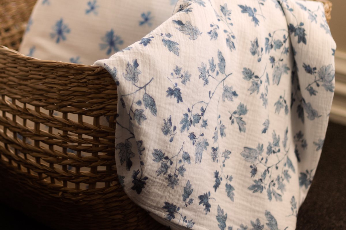 Fig and Cornflower muslin in a woven basket
